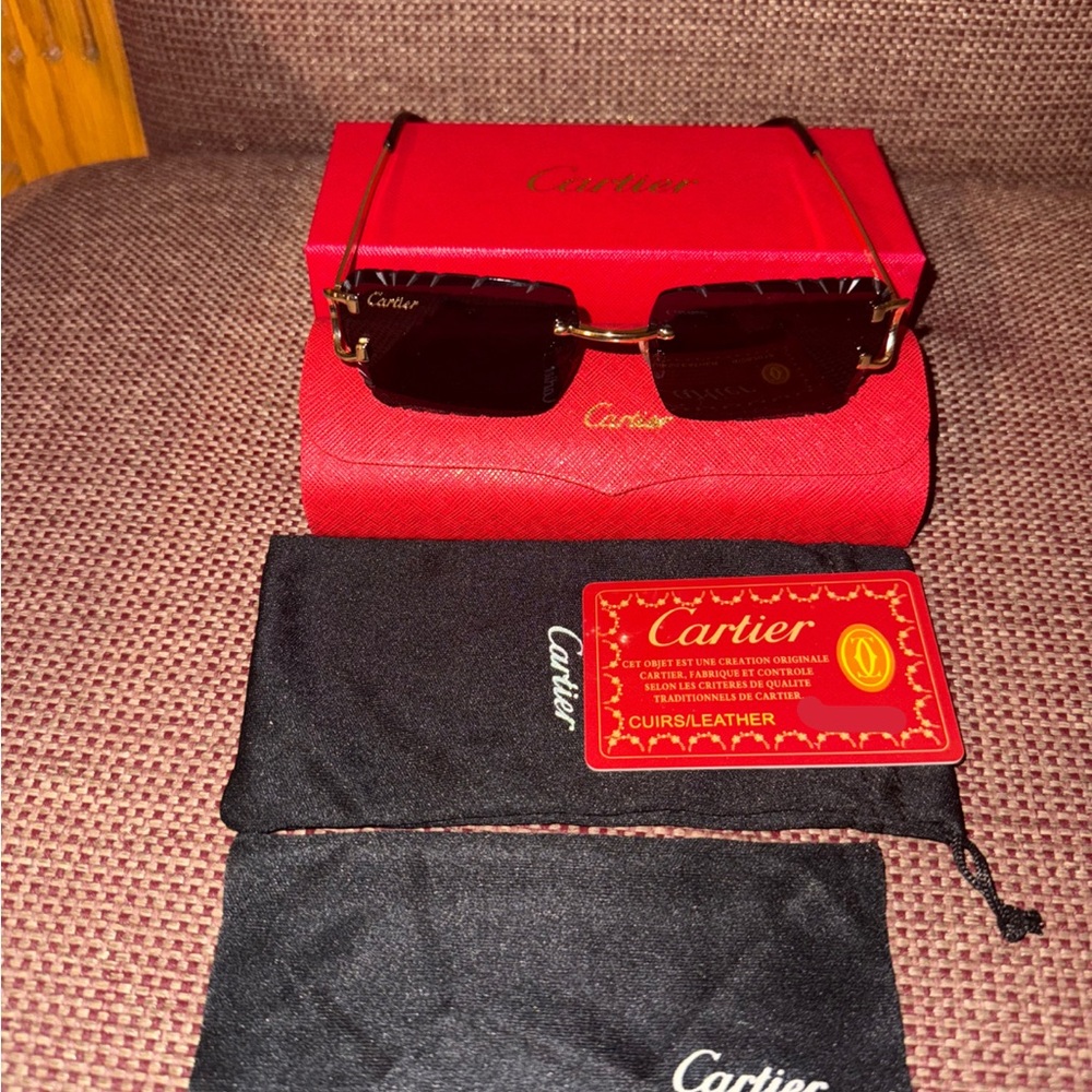 Cartier CT0092O Gold Frame Sunglasses with Black Lenses